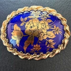 Elegant Golden and Blue Floral Brooch